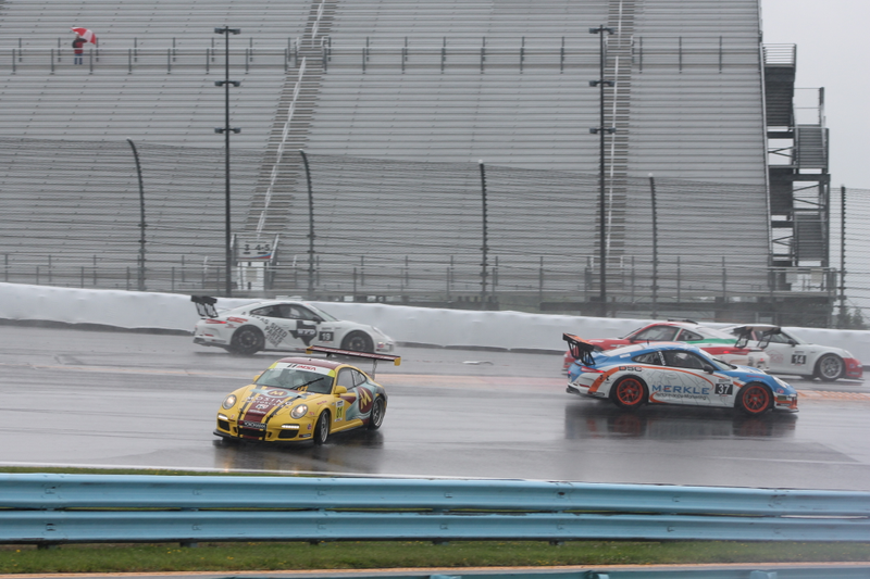 Illustration for article titled Standing Water Causes Mass 911 GT3 Cup Spin-Out At First Turn Of Race